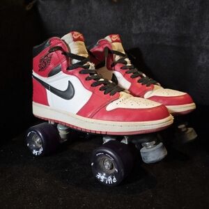 Red and White Roller Skates with Black Accents